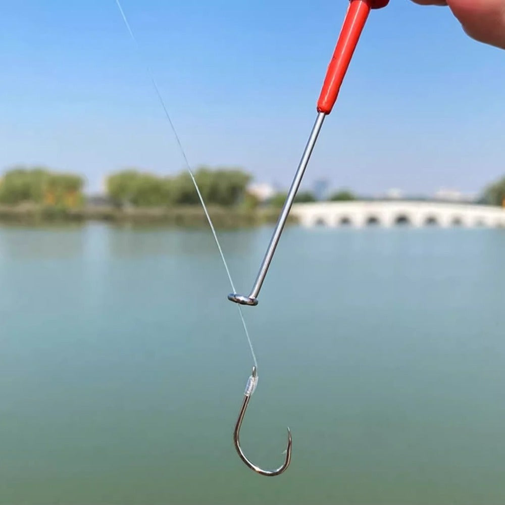 Hook remover loop guided along fishing line to the hook